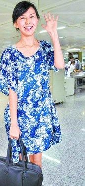 孙燕姿遭媒体追问婚事 笑言：早知道私奔(图)