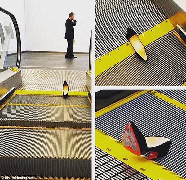 美国鞋履设计师高跟鞋嵌入手扶电梯中 使电梯停运