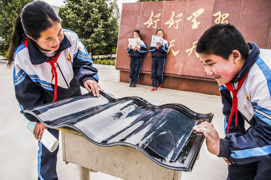“汉能阳光之旅”国际摄影师体验计划——走进阳坡头齐心希望小学